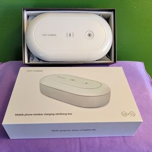 Mobile phone wireless charger and sanitizer